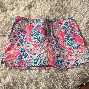 Lily Pulitzer bright pink and blue women’s skirt; shorts built in underneath.
